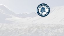UNAC logo with a picture of snowy Hatcher Pass mountains in the background